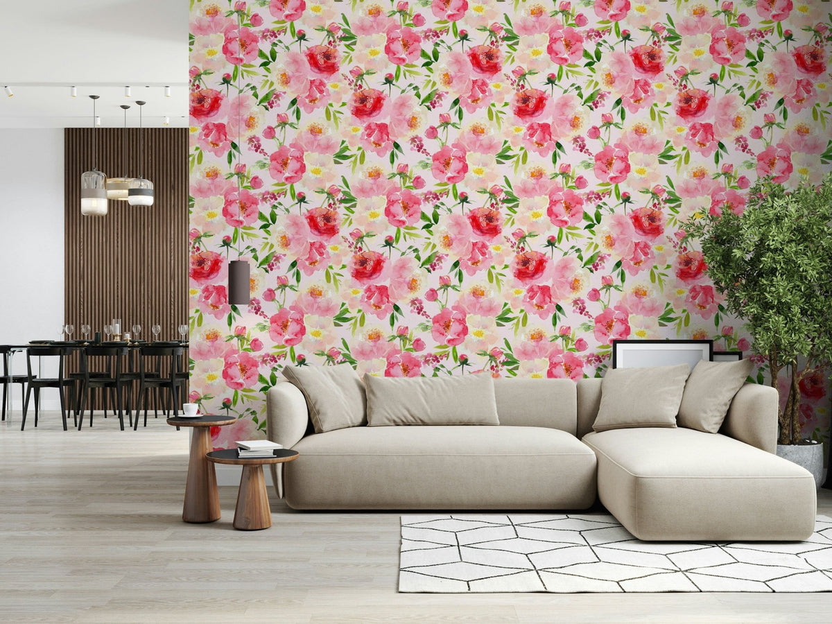 Blush Bloom Watercolor wallpaper behind a beige sectional sofa with a dining area in a living room