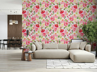 Blush Bloom Watercolor wallpaper behind a beige sectional sofa with a dining area in a living room