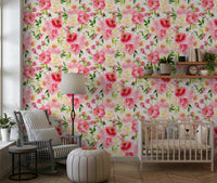 Blush Bloom Watercolor wallpaper in a nursery with a white crib and grey striped rocking chair