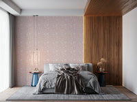 A soothing blush wallpaper with subtle blooming flowers repeated in a gentle spring-inspired design.