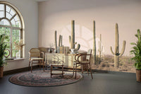 Soft cactus field wallpaper in muted pink tones

