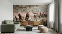 An artistic magnolia bloom mural on minimalist wallpaper.

