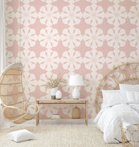 Pastel petal cutouts wallpaper for a cozy playroom.