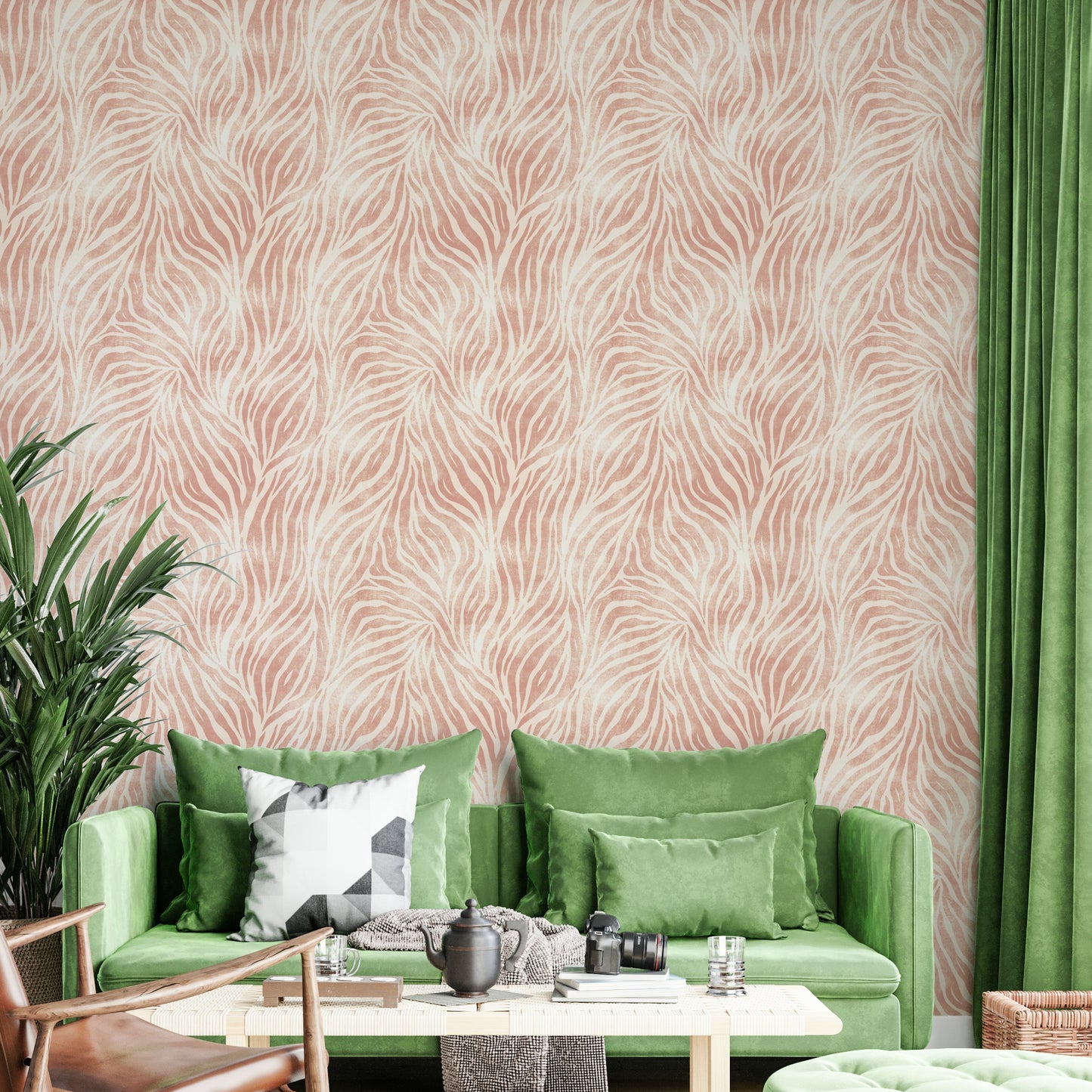 Blush Zebra Stripes wallpaper in a living room with a green velvet sofa, palm plant and green curtains