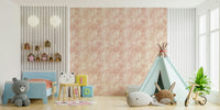 Blush Zebra Stripes wallpaper in a kids room with a blue bed, teepee tent and alphabet blocks