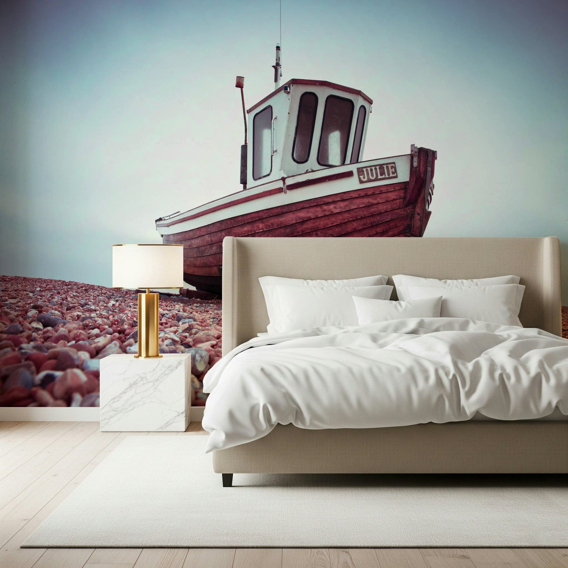Seaside Boat Resting on Pebbled Strand wall décor, fishing craft, grey sky.
