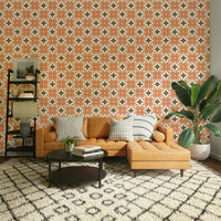 Boho-inspired wall mural with vibrant orange floral motifs.


