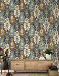 Patterned paisley wallpaper combining blue, mustard, teal, and cream for a boho look.