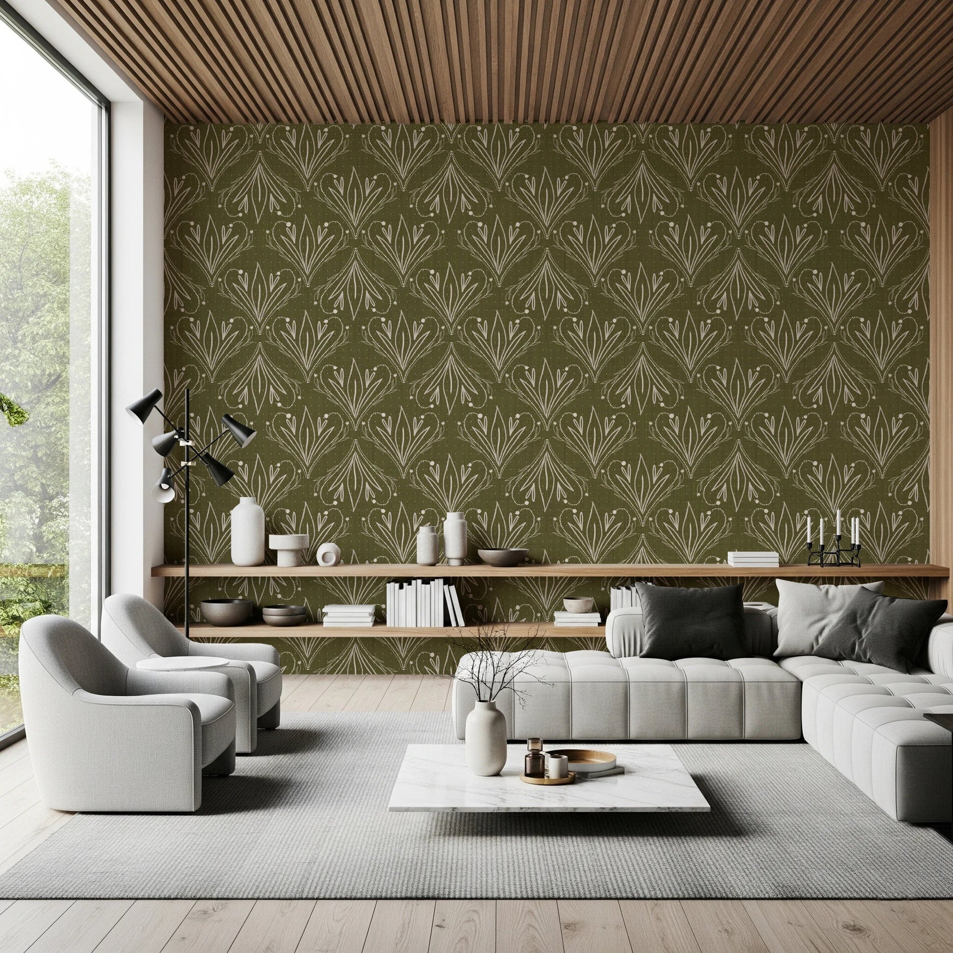 Boho Art Nouveau Folk Floral Olive Green wallpaper behind grey sofas under a wood slat ceiling in a living room