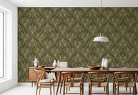 Boho Art Nouveau Folk Floral Olive Green wallpaper behind a wood dining table and wishbone chairs in a dining room