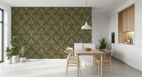Boho Art Nouveau Folk Floral Olive Green wallpaper behind a light wood dining table and wishbone chairs in a kitchen