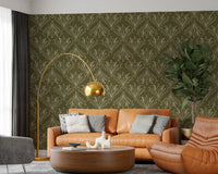 Boho Art Nouveau Folk Floral Olive Green wallpaper behind a cognac leather sofa and gold arc lamp in a living room