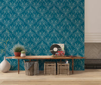 Boho Art Nouveau Folk Floral Teal Blue wallpaper behind a long wood console bench and woven baskets in a hallway