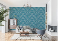 Boho Art Nouveau Folk Floral Teal Blue wallpaper behind a beige sofa and wood cabinet in a living room