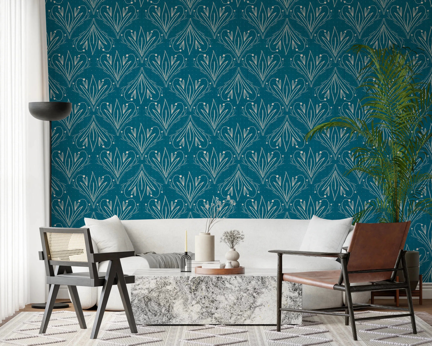 Boho Art Nouveau Folk Floral Teal Blue wallpaper behind a cream sofa and marble table in a living room