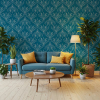 Boho Art Nouveau Folk Floral Teal Blue wallpaper behind a teal sofa with yellow cushions in a living room