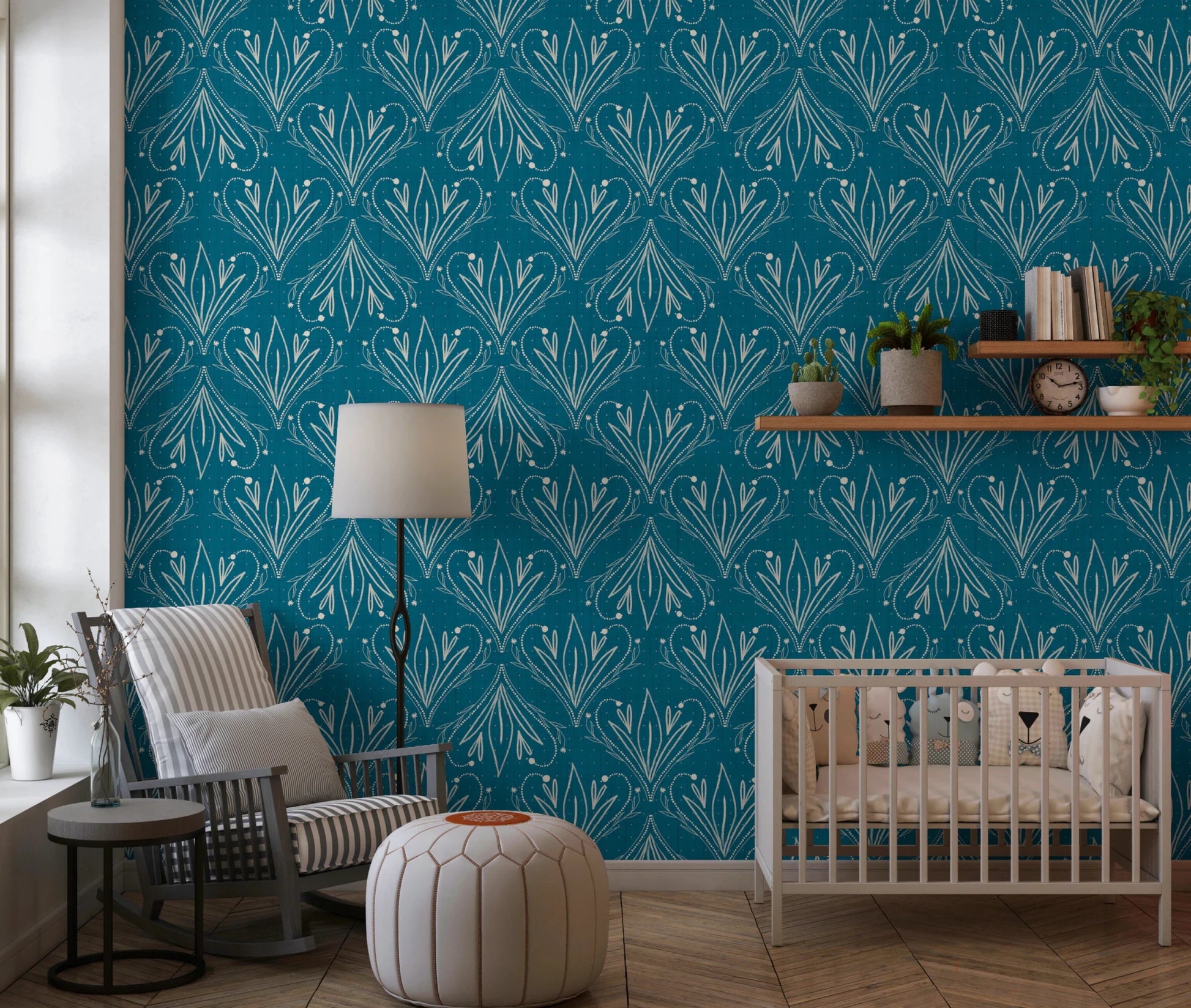 Boho Art Nouveau Folk Floral Teal Blue wallpaper behind a white crib and striped armchair in a nursery