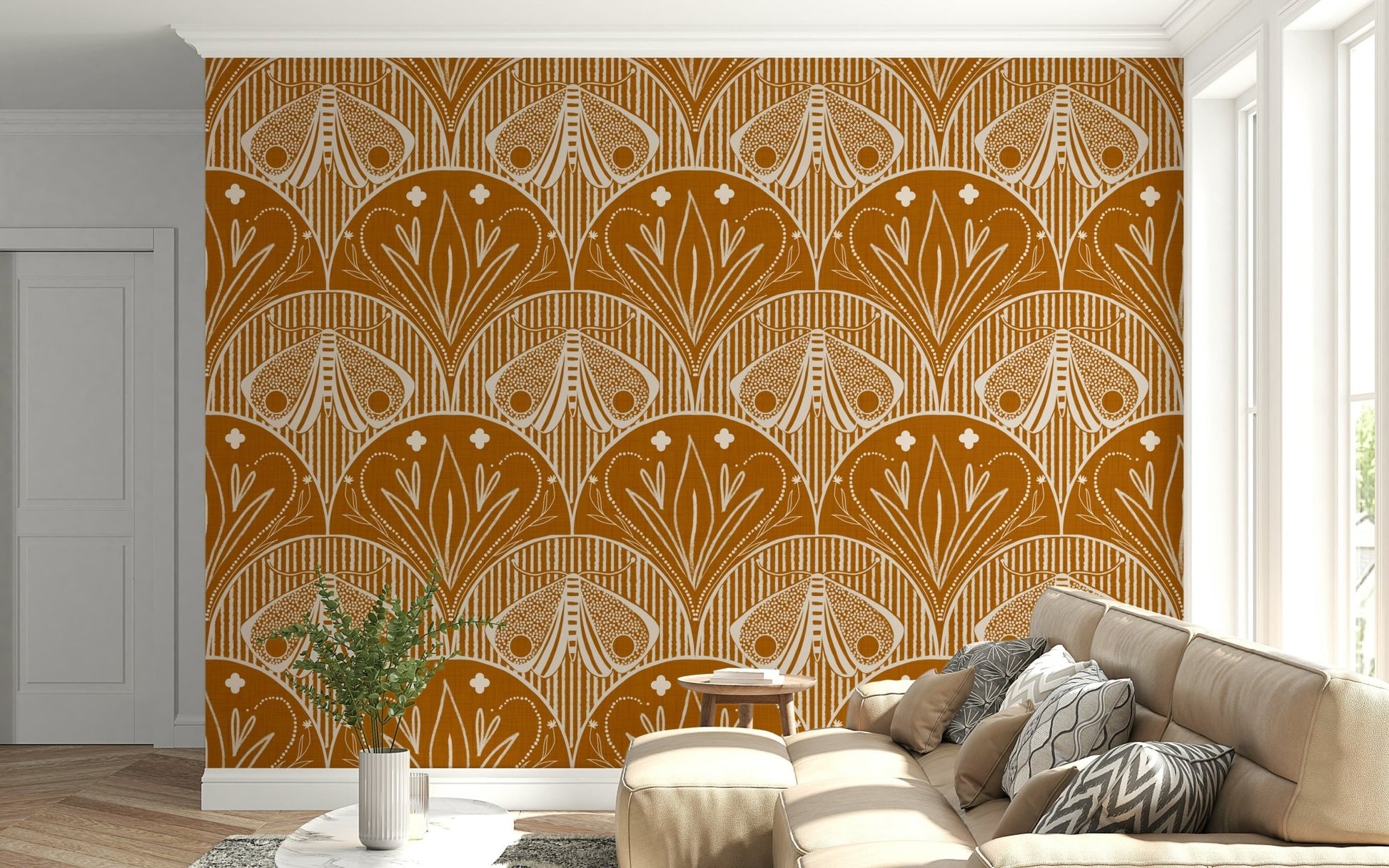 Boho Art Nouveau Scallop Butterfly Floral in Burnt Orange wallpaper mural behind a tan sofa in a living room