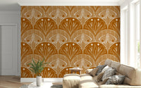 Boho Art Nouveau Scallop Butterfly Floral in Burnt Orange wallpaper mural behind a tan sofa in a living room