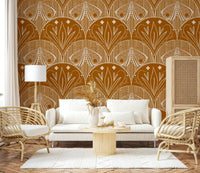 Boho Art Nouveau Scallop Butterfly Floral in Burnt Orange wallpaper mural behind a white sofa and rattan chairs