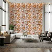 Retro-inspired boho wallpaper decorated with overlapping daisy-style flowers in muted warm colors.