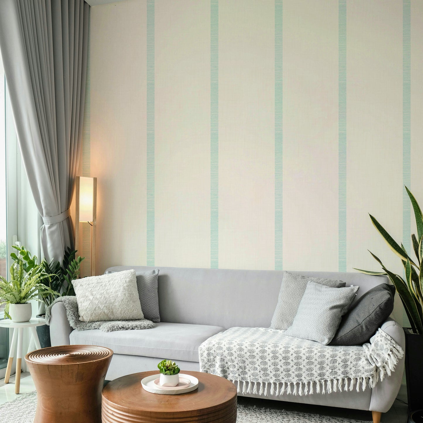Soft blue wallpaper with beige and gold boho stripe pattern

