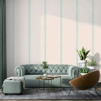 Beige and soft blue striped wallpaper with boho golden accents

