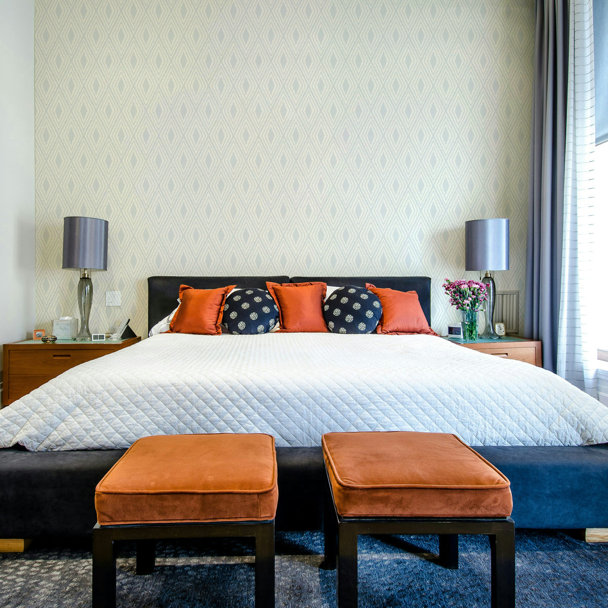 Harlequin pattern wallpaper in soft blue

