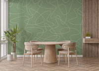 Subtle green geometric wallpaper with boomerang lines