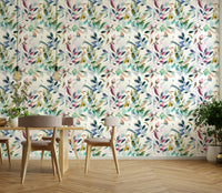 Artistic green leaves in watercolor on wallpaper

