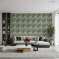 Botanical foliage wallpaper in a modern living room with sage leaves