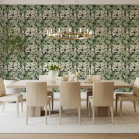Botanical leaf wallpaper for a calm dining room with dark contrast
