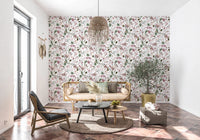 Botanical Winter wallpaper mural in a living room with a rattan bench sofa and woven pendant lamp