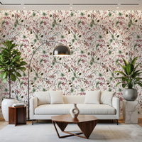 Botanical Winter wallpaper mural in a living room with a white sofa, gold arc lamp and fiddle-leaf plant