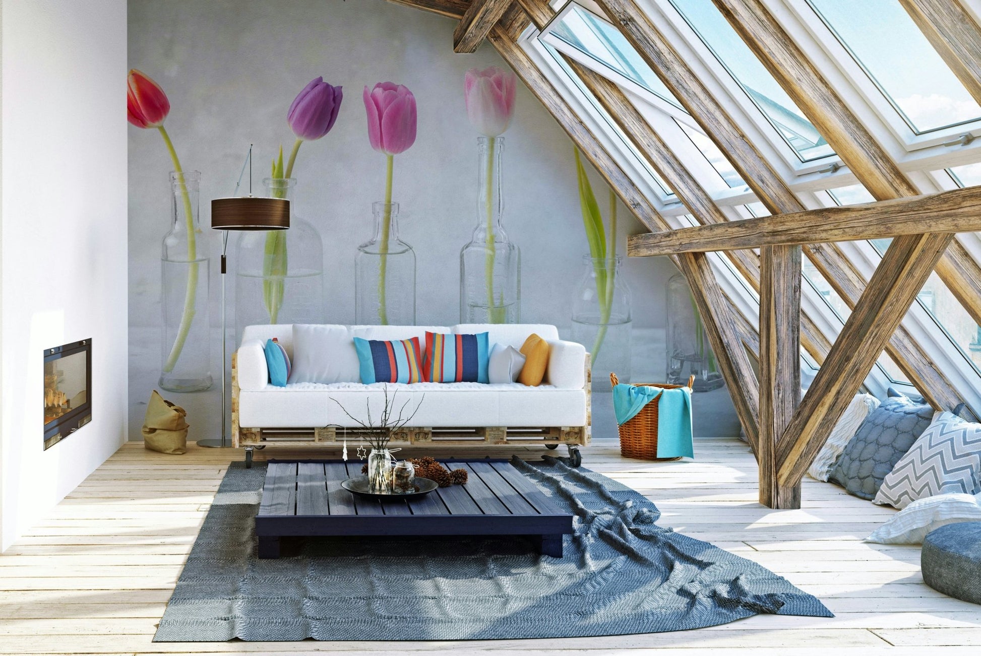 The background is simple and neutral, making the flowers and bottles stand out.

