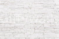 Bright Stacked Stone wall mural close-up showing the pattern detail of thin white stone tiles with grey veining