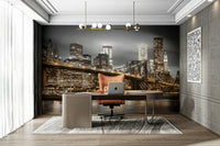 Black and gold NYC mural with Brooklyn Bridge at night

