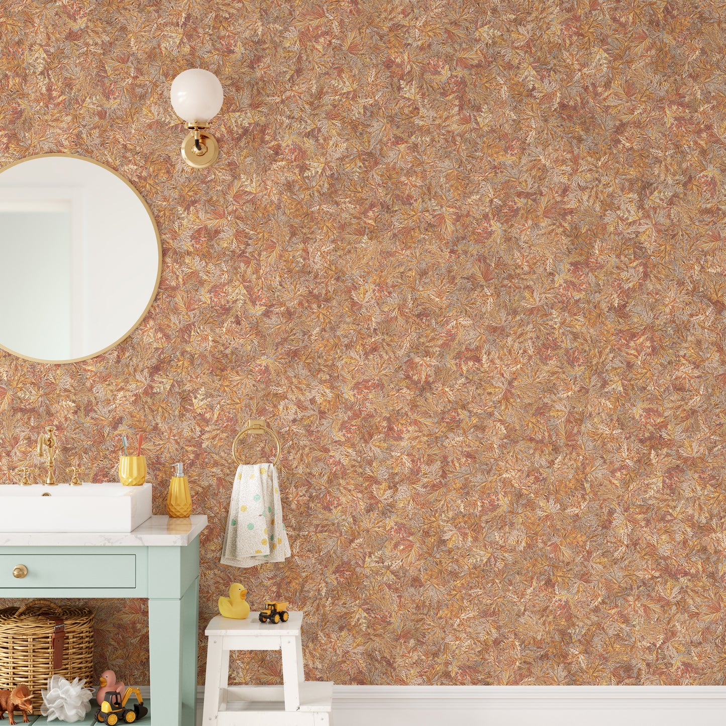 Brown Color Autumn Leaves wallpaper mural in rust tones above a mint vanity in a kids bathroom