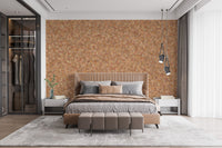 Brown Color Autumn Leaves wallpaper mural in warm orange behind a tan upholstered bed in a modern bedroom