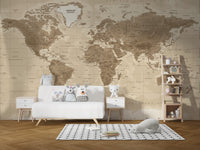 Brown Detailed Worldmap wall mural in sepia tones behind a white sofa with plush toys in a kids room