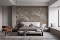 Brown marble textured wallpaper mural styled as a feature wall behind a dining table and chairs in brown tones