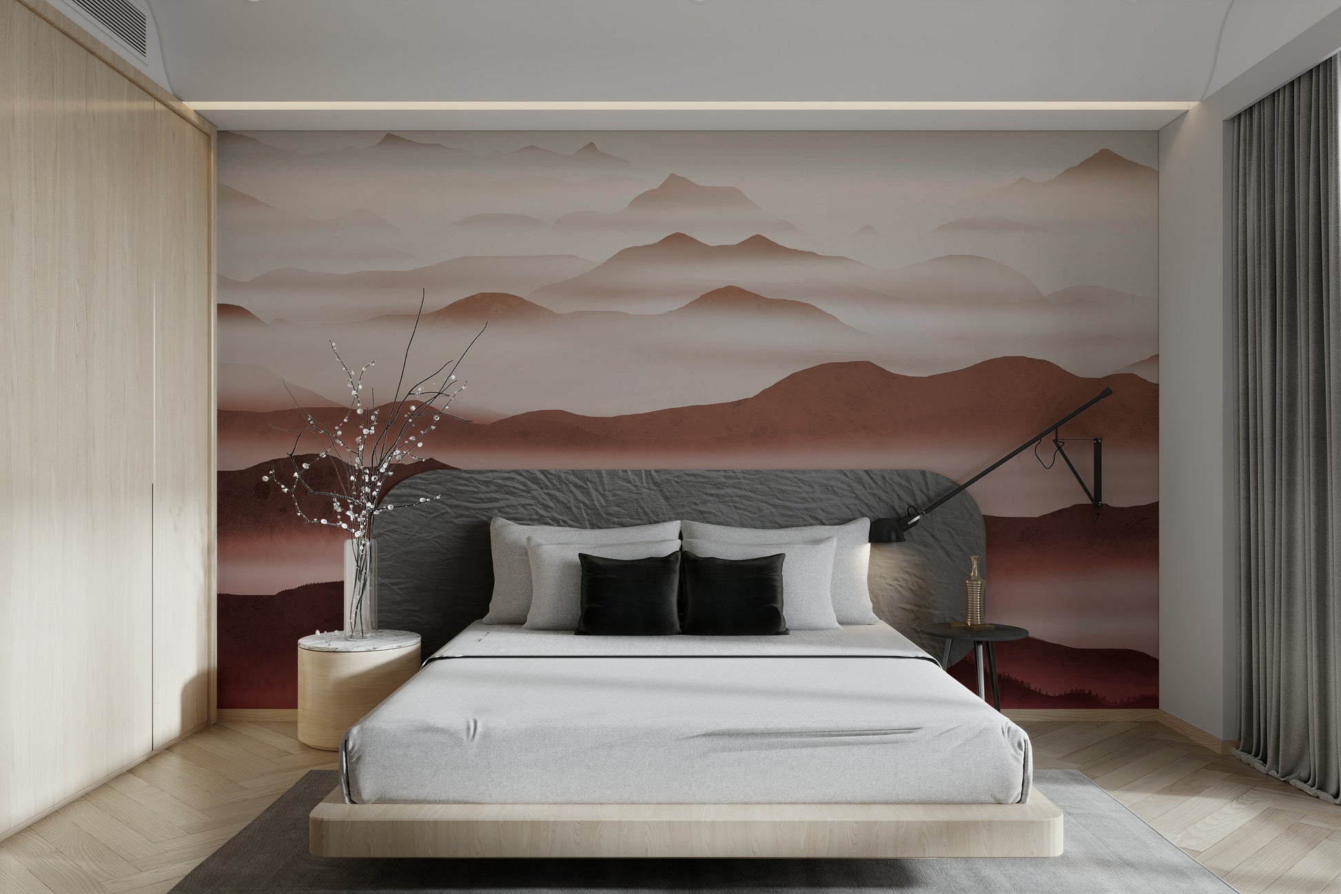 Burgundy Mountain Haze wallpaper of hazy burgundy peaks behind a grey headboard and white bedding with a blossom branch