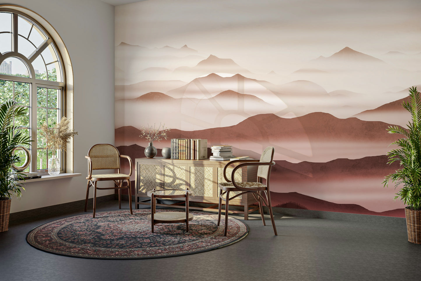 Burgundy Mountain Haze wallpaper of layered rose and cream misty peaks in a sitting nook with arched window and rattan chairs
