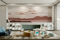 Burgundy Mountain Haze wallpaper of soft rose and cream peaks behind white arched cube shelving in a kids play area