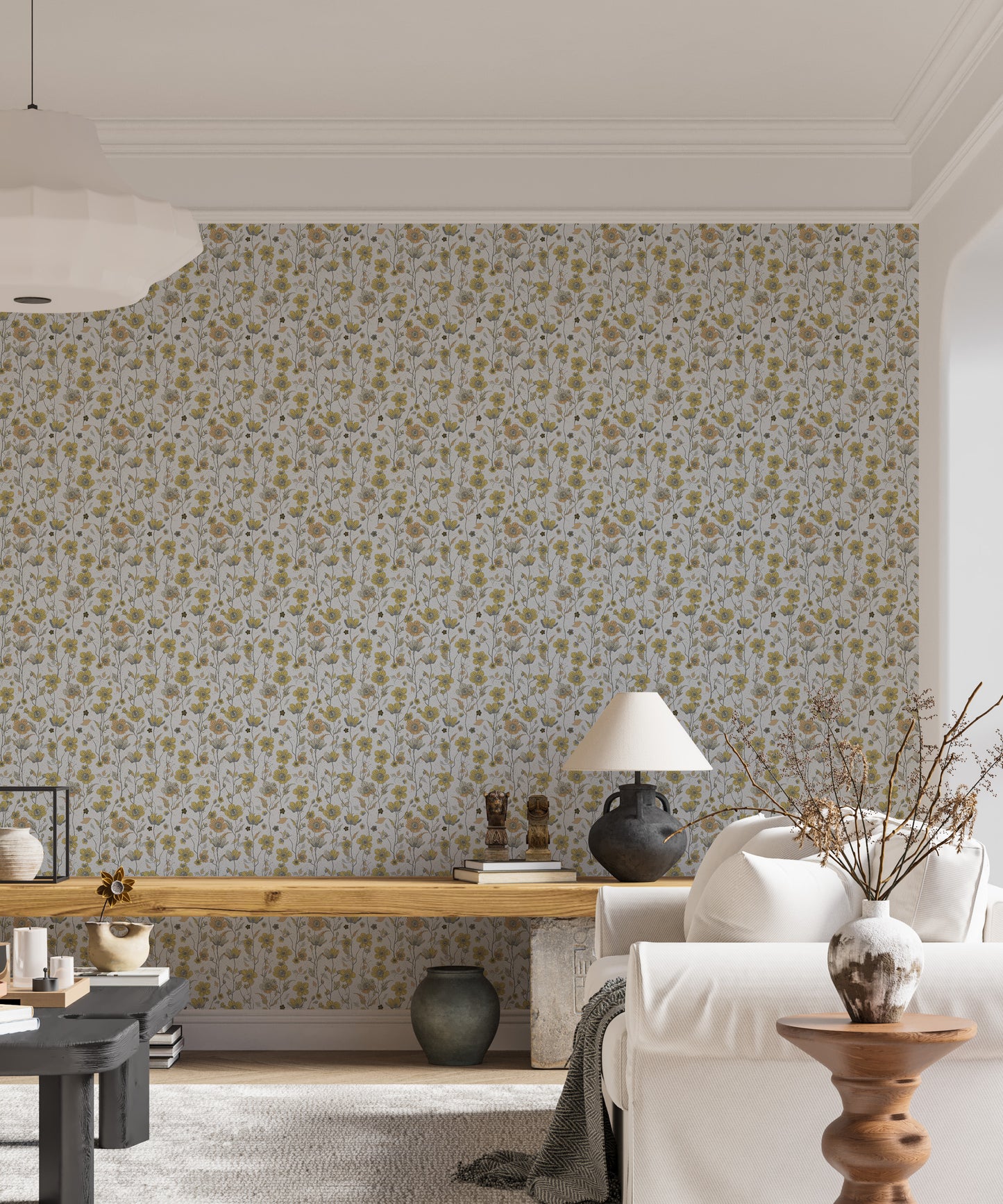 Buttercups Garden Golden and Gray wallpaper behind a white sofa and wooden bench in a bright living room