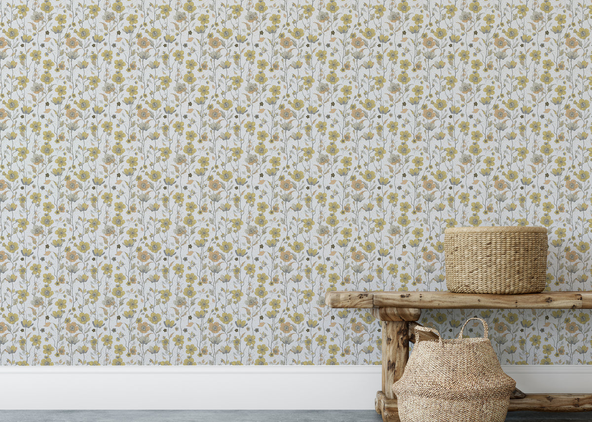 Buttercups Garden Golden and Gray wallpaper above a rustic wooden bench with seagrass baskets in an entryway