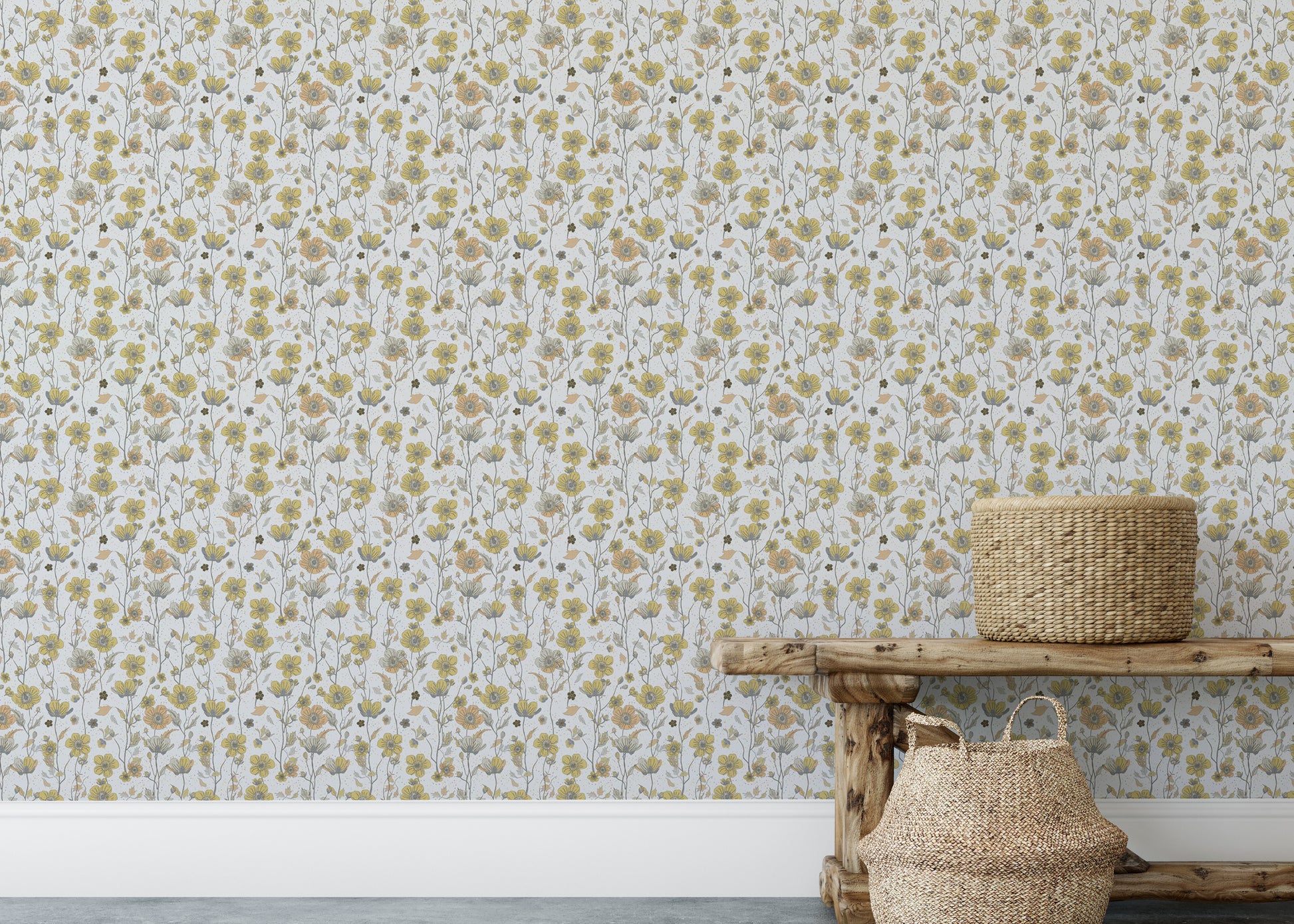 Buttercups Garden Golden and Gray wallpaper above a rustic wooden bench with seagrass baskets in an entryway