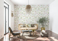 Soft watercolor blooms wallpaper with detailed insects