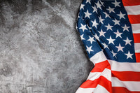 American Flag Rustic wallpaper close-up showing the stars and red and white stripes on a grey concrete surface