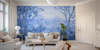 Autumn Forest Blue Color wallpaper mural of a blue forest landscape behind a cream sofa and armchairs in a living room